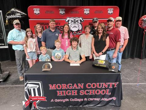 Mason Jackson recently signed his letter of intent in the Morgan County theater with friends and family there to support him. CONTRIBUTED