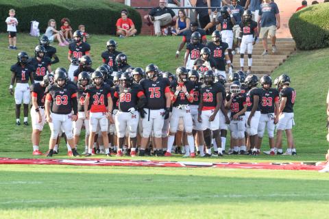 The Morgan County Bulldogs get set to take the field before a scrimmage against Cherokee Bluff last Thursday. LANCE MCCURLEY/Staff