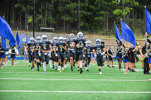 The Titans take the field for a scrimmage against Lakeview Academy on Aug. 11. CHARLES JORDAN/Staff