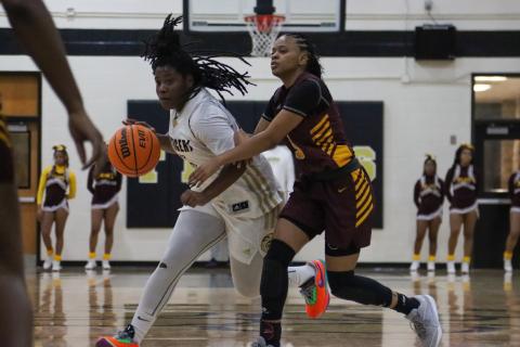 Greene County senior Amauria 'Osy' West drives the lane against Hancock Central. LANCE MCCURLEY/Staff