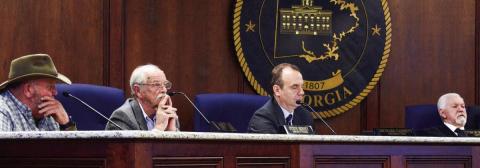 L-R: Putnam County Commissioners Jeff Wooten (Dist. 4), Dr. Steve Hersey (Dist. 3), Richard Garrett (Dist. 2), and Commission Chairman Bill Sharp listened to presentations about Georgia House Bill 581 while District 1 Commissioner Tom McElhenney attended the meeting by phone. IAN TOCHER/Staff
