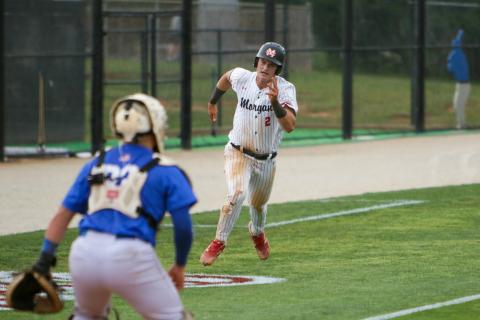 Morgan County junior Hudson Reed (3) rounds thirds base and advances to home plate. LANCE MCCURLEY/Staff 