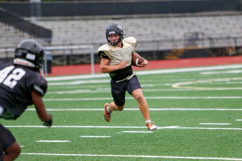 Greene County quarterback Landon Garretson returned for his senior season, hoping to lead the Tigers to a region title and a deep playoff run. LANCE McCURLEY/Staff