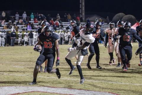 Morgan County senior running back Christian Monfort (23) finished the night with 190 yards on 34 carries with three touchdowns. SKYLA MORRIS/Staff