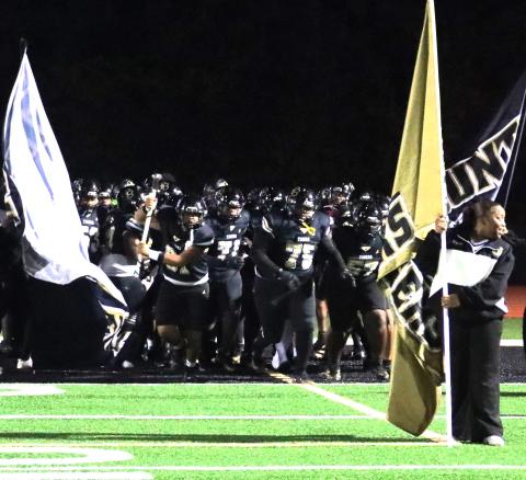 The Greene County Tigers take the field before their matchup against Lincoln County on Oct. 31. (COURTESY OF MOMMA D'S PIX)