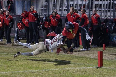Morgan County wide receiver Ty Tillery (1) dives for the pylon as Westside safety Paul Risper (12) attempts to force him out of bounds. SKYLA MORRIS/Staff