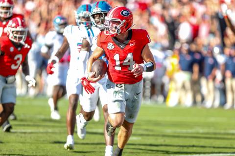Georgia quarterback Gunner Stockton (14) accounted for five touchdowns in the Bulldogs' 43-35 win over Ole Miss on Oct. 18. LANCE MCCURLEY/Staff