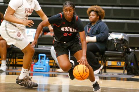 Morgan County senior Cydney Burke (24) drives the lane past a defender during a road game against Hart County on Dec. 2. LANCE McCURLEY/Staff