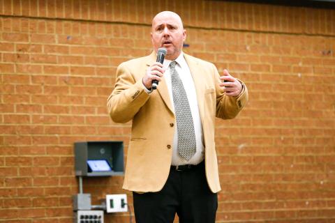 Rome assistant coach Chris MacFarland spoke first, talking to the crowd about various topics, including his head coaching experience and what he would bring to the Greene County program. LANCE MCCURLEY/Staff