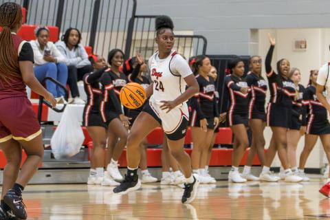 Cyndey Burke brings the ball up the floor for the Lady Dogs during a game earlier this season. SKYLA MORRIS/Staff