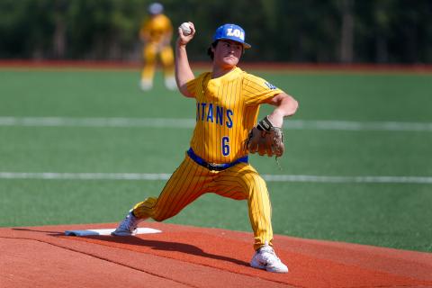 Lake Oconee Academy junior Ty Hiter comes set in the stretch, preparing to deliver a pitch to the plate in Game 1 against Early County. LANCE MCCURLEY/Staff