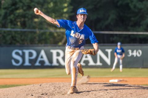 LOA's Dylan Hiter gets set to deliver a pitch during a game against Athens Academy on April 15. SKYLA MORRIS/Staff