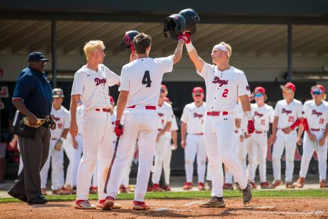 Morgan County High School's Hudson Reed (2) and Davis Strickland (4) celebrate after rounding the bases. SKYLA MORRIS/Staff
