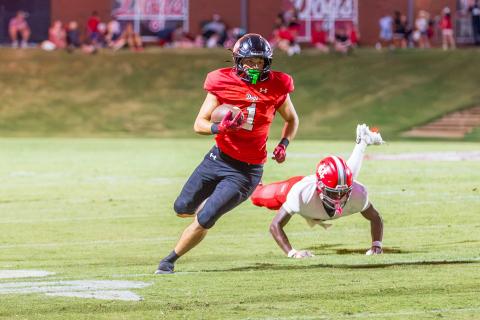 Morgan County senior running back Alex Corrias (1) breaks into the open field against Madison County. SKYLA MORRIS/Staff