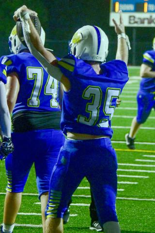 Stanford (35) celebrates after scoring one of his four touchdowns against Mount Pisgah. IAN TOCHER/Staff