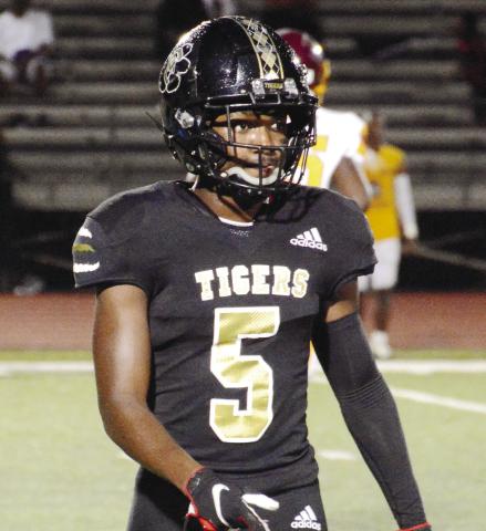 Greene County alumnus Arkiyus Wright (5) walking off the field during last season’s game against Hancock Central. BRENDAN KOERNER/Staff