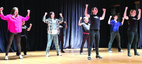 The Arts Barn cloggers dance to the song “High and Mighty” by Christ Church Choir and Dolly Parton.
