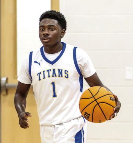 LOA senior point guard Christopher Taylor brings the ball up the floor during a game earlier this season. SKYLA MORRIS/Staff