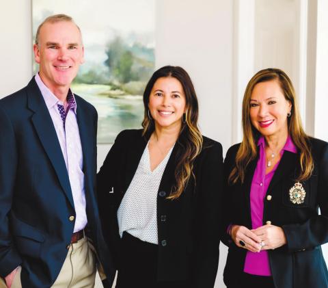 Ted and Riezl Baker welcome Charlotte Hildreth (center) to the Luxury Lake Oconee real estate sales team. CONTRIBUTED