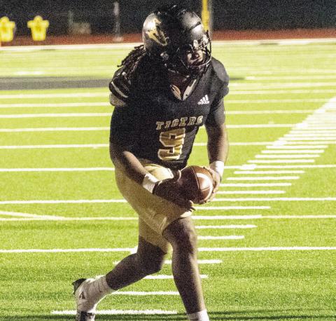 Greene County running back Amari Durham (9) celebrates after scoring his team’s only touchdown of the night in the loss to the Indians. JONATHAN ANES/Contributed