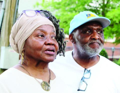 Greene County African American Museum founder and historian Mamie Hillman and her husband, John Hillman Sr., listen to one of the speakers before the marker is unveiled. LYNN HOBBS/Staff