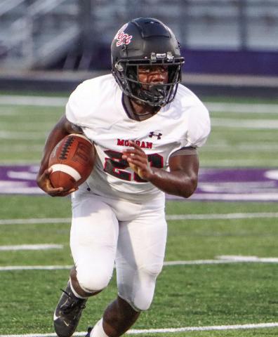 Morgan County freshman running back Damonee Smith (28) rushed for a team-high 129 yards and a touchdown on 14 carries in last Friday’s win over Pike County. LANCE McCURLEY/Staff