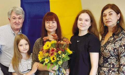 Chris Penna with Arina, Natasha and Luiza Bezsonova, and Violeta Penna at a church reception. CONTRIBUTED