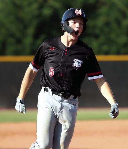 Caylem Richardson celebrates as he rounds the bases after hitting a solo home run. LANCE McCURLEY/Staff