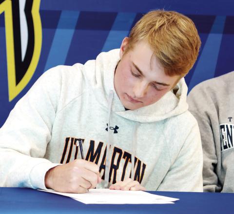 LOA senior golfer Drew Williams puts pen to paper Nov. 8, committing to the University of Tennessee-Martin. LANCE MCCURLEY/Staff