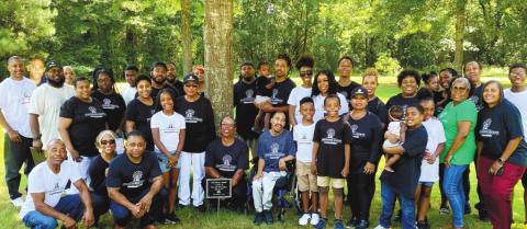 Greene family with the tree. CONTRIBUTED