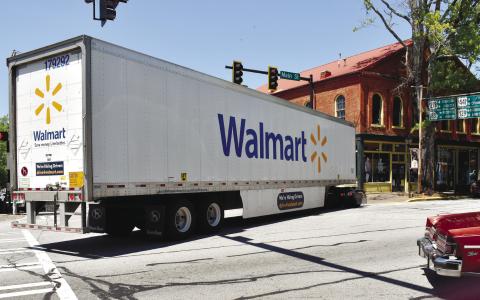 A tractor-trailer makes the difficult turn from South Main Street onto West Washington Street. A bypass west of Madison would put an end to congestion like this in downtown Madison. T. MICHAEL STONE/Staff