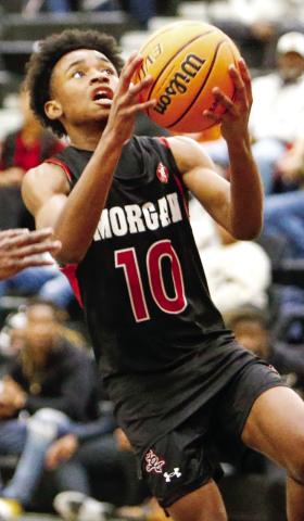 Morgan County sophomore Dreylon Brown (10) goes up for a layup in a road game against Hart County on Dec. 2. LANCE McCURLEY/Staff