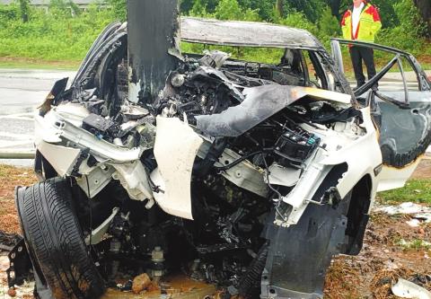 An Eatonton man died when his car crashed into the traffic light pole on Highway 44 at Scott Road and burst into flames. Passersby pulled the man out of the car before it burned. CONTRIBUTED/PCSO