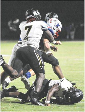 Greene County junior R.J. Monford (7) brings down an Oglethorpe County ball carrier. CHARLES JORDAN/Contributed
