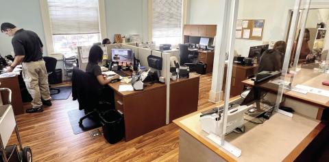 The most crowded space in the courthouse is the Clerk of Superior Court’s office with 6 desks behind the customer service window. MARK ENGEL/Staff