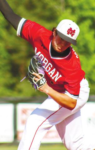 Sam Schofield gets set to deliver a pitch from the mound in game one against Mary Persons. LANCE McCURLEY/Staff