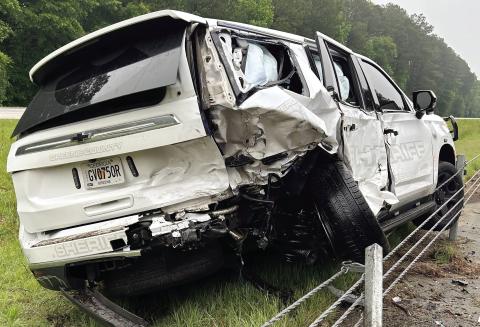Sgt. Will Smith’s Chevy Tahoe was hit so hard the vehicle flew over the median barrier before landing in the median. CONTRIBUTED