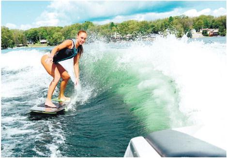 Purpose-built wakeboard boats are capable of creating sizable wakes that now must originate at least 200 feet from shore or structures, according to new Georgia law. Courtesy Benjamin Klaver/Unsplash.com