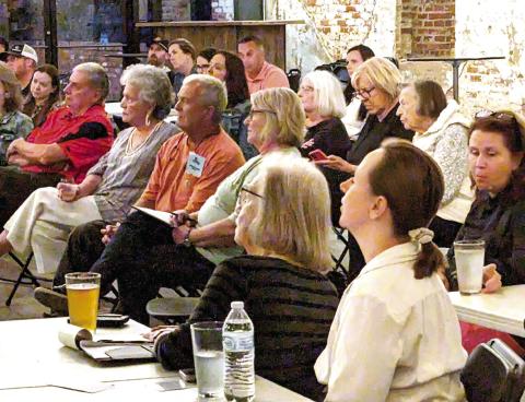 Attendees listen and ask questions of Otho Tucker and Maggie Combs as they run for the Greene County Board of Education. MAUREEN STRATTON/Staff