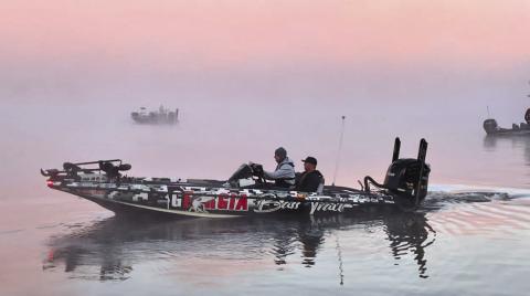 Anglers depart beneath an early morning fog hovering over Lake Oconee. CONTRIBUTED