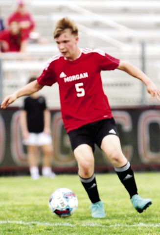 Morgan County sophomore striker Korbin Hegwood (5) scored a hat trick in an 8-1 win over Dougherty last Wednesday. (WILL MORRISON/Staff)