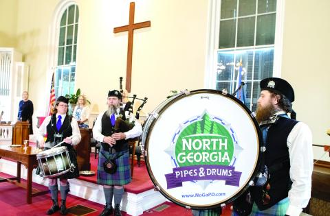 Musicians of the Athens Piper Band perform at the First Presbyterian Church of Greensboro. (LEIGH LOFGREN/Staff)