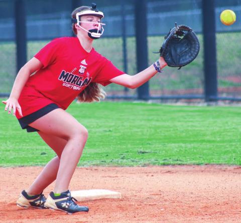 Middle-schooler Brynlee McBay gets set to make a play at second base. LANCE McCURLEY/Staff
