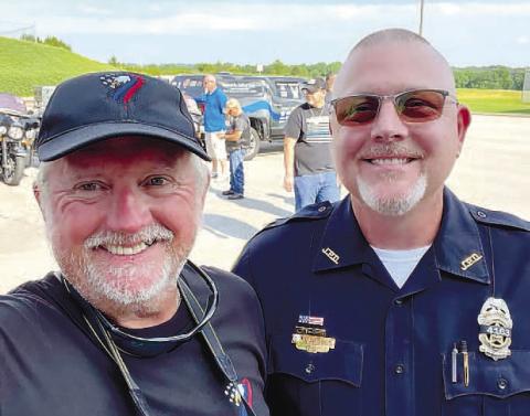 Royster (right) with a participant, Chief James Arwood (left) of Jefferson,, during one of the End of Watch Ride ceremonies. CONTRIBUTED