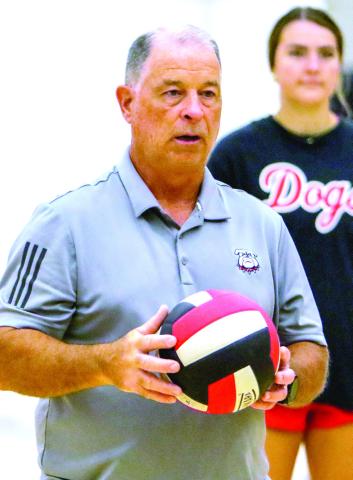Morgan County volleyball head coach Alan Shultz instructs his players during a recent practice. LANCE McCURLEY/Staff