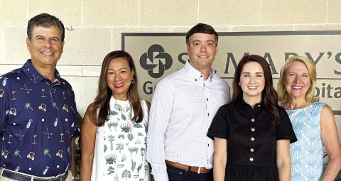 (L-R) Gala committee member Chuck Shaheen, gala chair and foundation board member Riezl Baker, Landmark Development and Construction owners Brandon and Emily Burgess, and gala committee member Christa Hyatt pose for a photo at St. Mary’s Good Samaritan Hospital. CONTRIBUTED