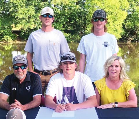 Will Thomas signs with the Montevallo Falcons and is joined by his fishing partner, Wyatt Spinks, (top left), former teammate/brother Ryan Thomas (top right), father and coach Gregg Thomas and mother Andrea Thomas. Ryan is a current member of the University of Montevallo Bass Fishing team and will partner with Will next year. CONTRIBUTED