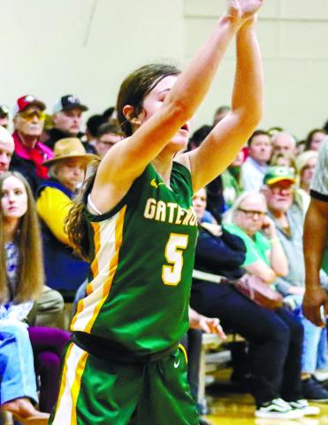 Freshman Natalie Sills (5) shoots for 3 for the Gators. LANCE McCURLEY/Staff