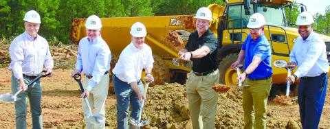 Company officials and doctors from Athens Orthopedic Clinic took part in a ceremonial groundbreaking for a new facility scheduled to open by next summer in Greene County. IAN TOCHER/Staff
