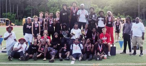 The Morgan County track and field teams pose for a photo after sweeping the Region 4-AA meet, capturing both the boys and girls team titles. CONTRIBUTED